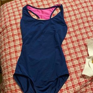 Partial open back leotard.